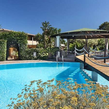 Гостьовий будинок Relais Fenicottero Rosa Порто-Таверна Екстер'єр фото