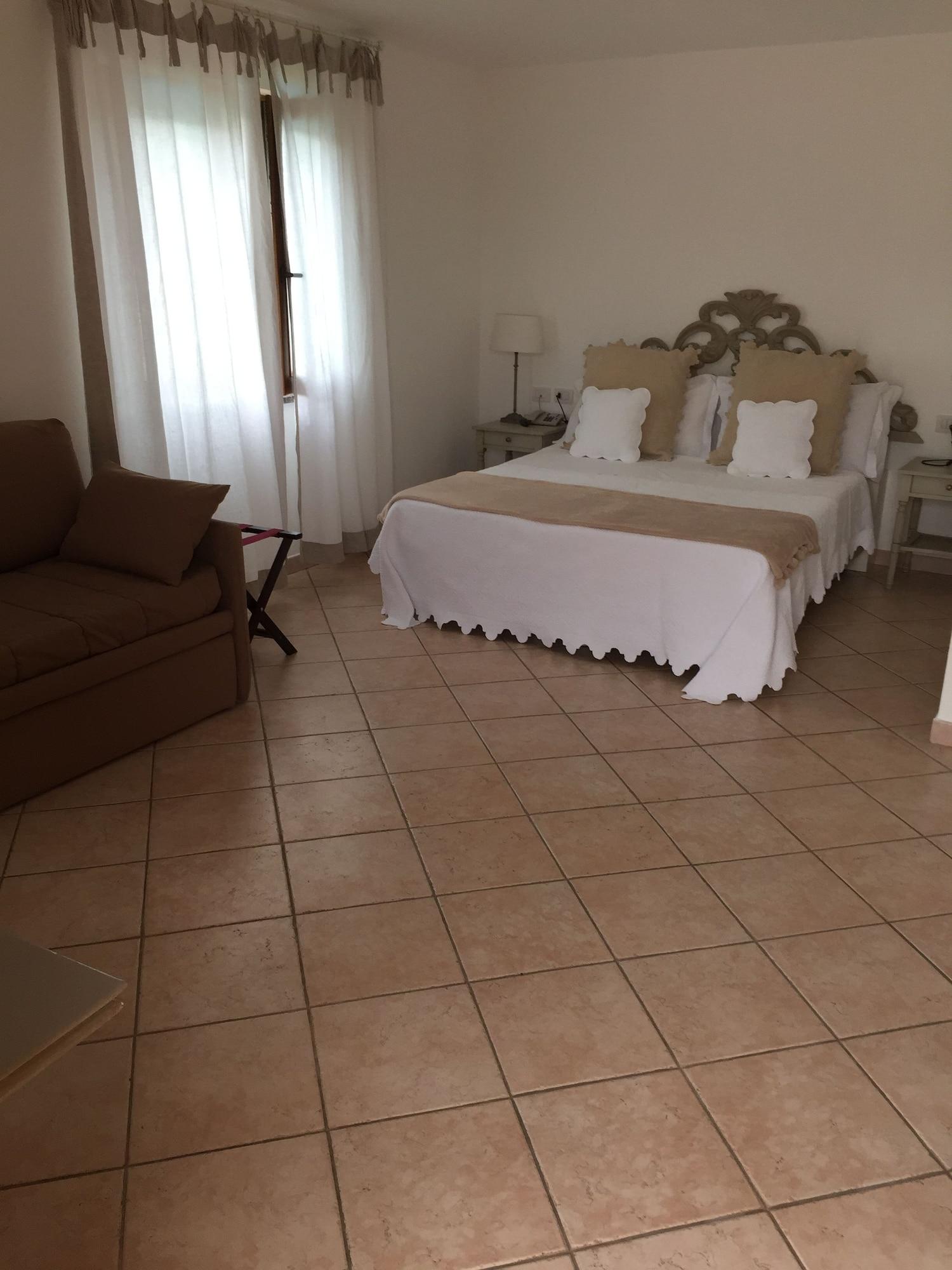 Гостьовий будинок Relais Fenicottero Rosa Порто-Таверна Екстер'єр фото