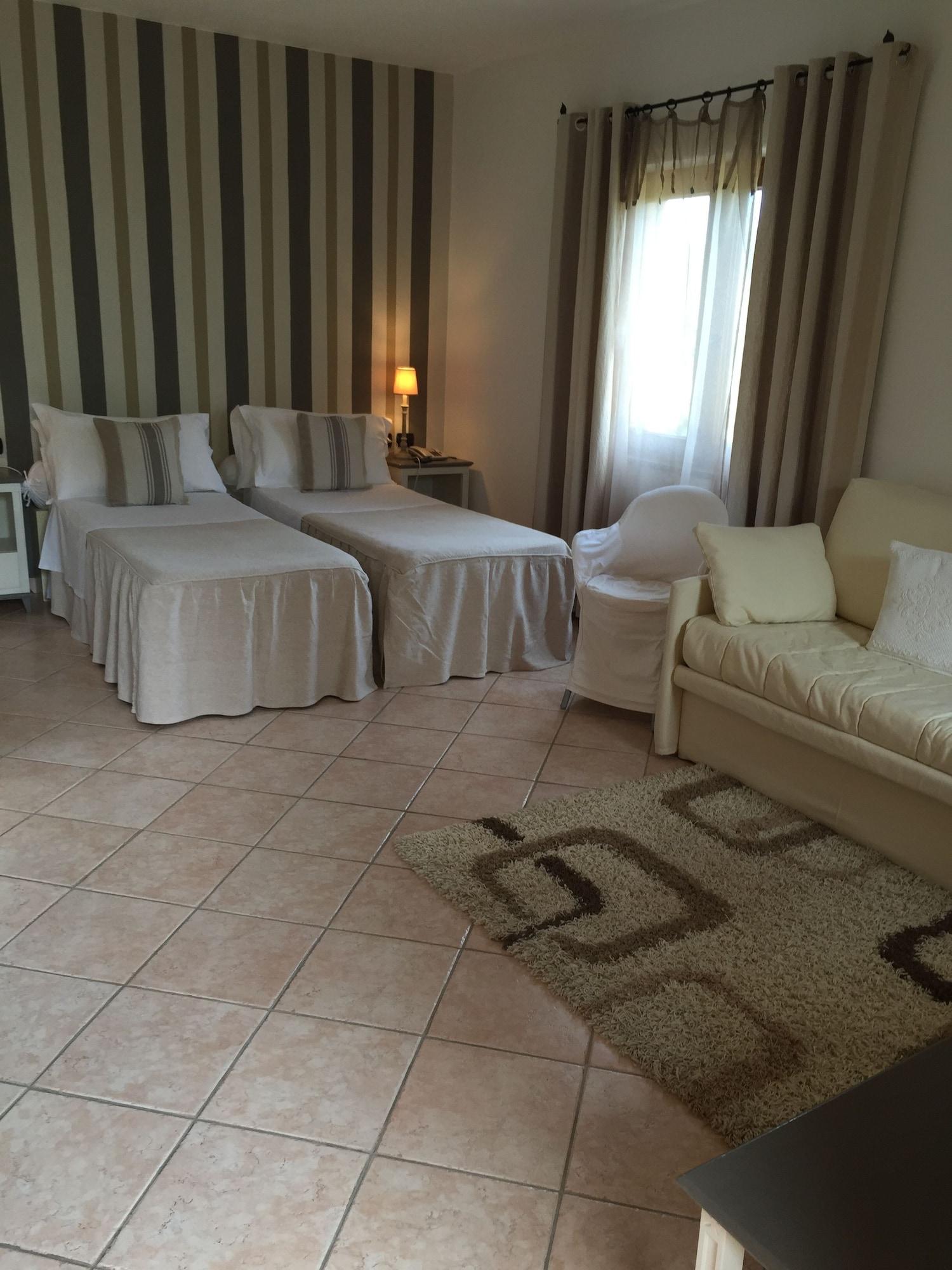 Гостьовий будинок Relais Fenicottero Rosa Порто-Таверна Екстер'єр фото