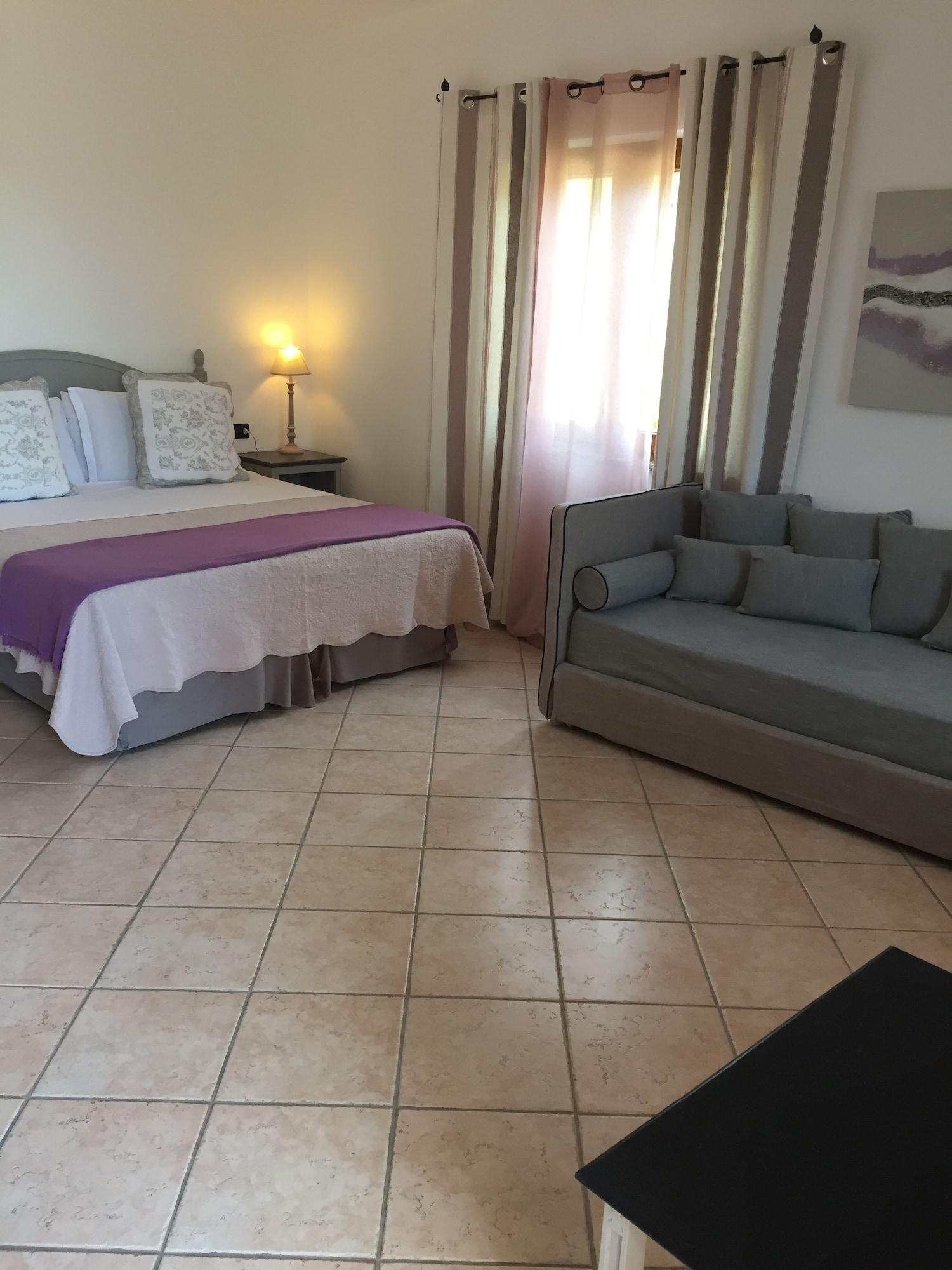 Гостьовий будинок Relais Fenicottero Rosa Порто-Таверна Екстер'єр фото